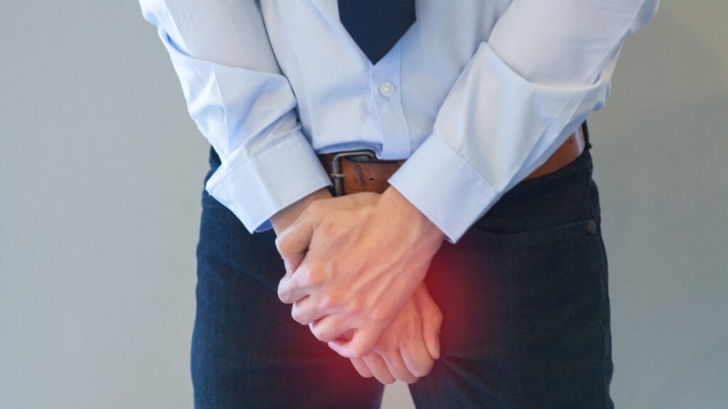 Man,In,Office,Uniform,Having,A,Problem,With,His,Crotch